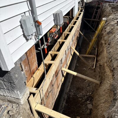 Recent foundation repair project by Dry Otter Basement Waterproofing, showcasing carbon fiber reinforcement techniques.